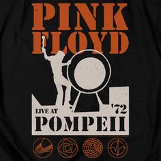 the pink floyd concert poster is shown on a black t - shirt with an orange and white design