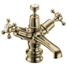 a faucet with two handles and nozzles