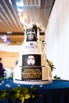 a star wars themed wedding cake on a table