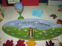 the lord is my shepherd sign on a table