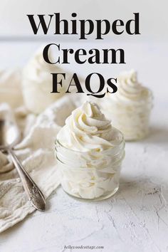 whipped cream faqs in a small glass jar with a spoon next to it