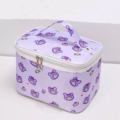 Oh, sweetheart! You need this bag in your collection! It's perfect for travel, toiletries, or carrying a few of your must-have beauty essentials. This cosmetic bag has plenty of room for storage, a carrying handle, and has a cute kawaii pattern with a metal zipper. Details: 23cm*17cm*15.3 cm metal zipper polyester Cute Large Capacity Cosmetic Bag For School, Large Capacity Cute Cosmetic Bag For School, Cute Rectangular Cosmetic Bag For School, Kawaii School Cosmetic Pouch Bag, Cute Large Capacity Rectangular Cosmetic Bag, Kawaii Travel Bag With Zipper Closure, Cute Large Capacity Storage Bags, Cute Large Capacity Box Bag For School, Kawaii Rectangular Travel Pencil Case