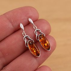 This is 925 Sterling Silver Earrings & Genuine Baltic Amber .     Approx. earrings measures:                total length: 31mm               drop length: 25 mm               width: 8 mm     Approx. weight: 3.1gr. Presented in gift box! Polished Drop Earrings For Gift, Polished Finish Drop Earrings For Gift, Silver Teardrop Earrings With Polished Finish For Gift, Sterling Silver Long Drop Teardrop Earrings For Formal Occasions, Gift Long Drop Earrings With Polished Finish, Classic Silver Teardrop Earrings Gift, Elegant Amber Sterling Silver Earrings, Sterling Silver Long Drop Earrings As Gift, Formal Teardrop Earrings Stamped 925