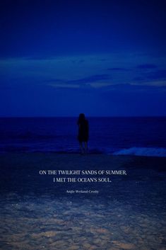 a person standing on the beach at night with an ocean in the background and a quote written below