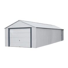 a white garage with a gray roof and side door on the right side of it