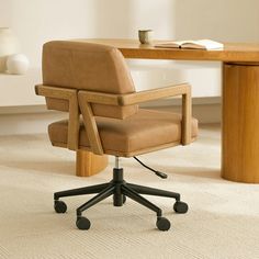 a brown office chair sitting on top of a white carpeted floor next to a wooden table