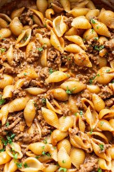 pasta with ground beef and parsley in a skillet, ready to be eaten