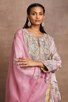 Pink straight kurta featuring hand embroidery in zari, silk threads, and sequins work. Paired with a yellow banarasi brocade salwar and a matching pink cotton tissue dupatta., Fit: Relaxed Embroidered Tissue Silk Unstitched Suit For Reception, Festive Silk Traditional Wear With Intricate Embroidery, Festive Traditional Silk Wear With Intricate Embroidery, Silk Dupatta With Chikankari Embroidery For Reception, Festive Silk Kurta With Intricate Embroidery, Tissue Silk Traditional Wear With Straight Kurta For Reception, Unstitched Suit With Chikankari Embroidery For Reception And Festivals, Traditional Wear Tissue Silk Straight Kurta For Reception, Silk Blouse With Chikankari Embroidery For Reception