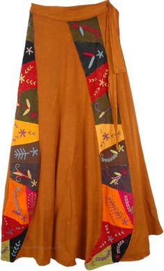 Nature Theme Wrap in Tuscany Brown Orange - A long cotton wrap with a warm palette of colors, vibrant, bright, and lively, this wrap is a beautiful choice for this coming autumn. With its palette of warm colored blocks each depicting different abstract grasses sewed into the fabric, it bespeaks both fall and harvest. This is elegant skirt wraps around the waist and ties at the side. A light weight, cotton skirt that will keep you cool and comfy in August and September, as summer transitions to f Orange Cotton Skirt For Fall, Spring Multicolor Cotton Wrap Skirt, Multicolor Cotton Wrap Skirt For Spring, Spring Hippie Cotton Wrap Skirt, Hippie Cotton Wrap Skirt For Spring, Multicolor Long Cotton Wrap Skirt, Multicolor Cotton Long Wrap Skirt, Spring Cotton Wrap Skirt, Multicolor Wrap Skirt For Festivals