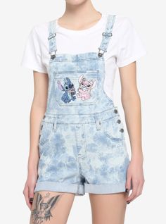 Need something to wear on your ice cream date with Stitch and Angel? These light acid wash shortalls are perfect for keeping you cool on a warm Hawaiian day! From Lilo & Stitch  these shortalls feature an embroidered image of Stitch and Angel enjoying tasty ice cream cones on the chest pocket. Comes with adjustable straps hip and back pockets cuffed hem and six side buttons. Please note: Wash pattern may vary. Cute Stitch Outfits, Lilo And Stitch Outfits, Stitch And Angel Onesies, Lilo And Stitch Clothes, Stitch Clothes For Kids, Stitch Jumpsuit Disney, Stitch Clothes Summer, Stitch And Angel Sweatshirt, Stitch Outfits