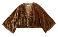 New with tags women's size Large Free People Velvet Bed Jacket. Brown, lace trim, tie front, wide bell sleeves and pleating at the shoulder. Shell 75% viscose and 25% nylon. Lining is 100% viscose, dry clean. Measurements taken in inches across jacket laid flat. Armpit: 28" Length: 21.5" Brown Velvet Bed, Bed Jacket, Free People Velvet, Velvet Bed, Brown Velvet, Winter 2023, Boho Look, Bell Sleeve, Vest Jacket