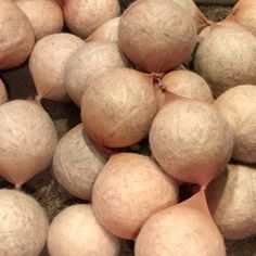 a pile of onions sitting on top of a counter