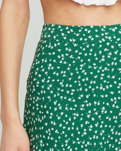 Price Comparison Few Moda $49 Alice + Olivia $440 Max Mara $125 Product Details Fun and fresh, this midi skirt is done in a sweet green print with a simple silhouette.- Back zipper- Lined- Content: 100% Polyester Style# K22WSK60008 Fit Notes - Model wearing a size S- Model measurements: Height: 5'10" Bust: 34" Waist: 24" Hips: 35" Bra Size Charts, Simple Silhouette, Price Comparison, Green Print, Green Skirt, Active Wear Tops, Max Mara, Alice Olivia, S Models