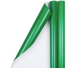 three green and white plastic tubes on top of each other