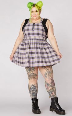 I prefer being an outsider, it's too crowded in thee, anyway. Look grunge, rebellious and cute all at once with this lavender pinny! Featuring a pastel tartan pattern, the pinny has a pleated skirt and a statement zip on the bib. The shoulder straps cross at the back to join to a large, statement O ring. Kick back in this frock with a beret and combat boots for easy spring lewks. Material: 98% Cotton, 2% ElastaneCare: Cold machine wash. Do not bleach, soak, wring or tumble dry. Fional Sale. Look Grunge, Chunky Boots, Tartan Pattern, Goods And Services, O Ring, Skirt Fashion, A Line Skirts, Fabric Care, Pleated Skirt