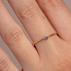 A simple solitaire ring with a natural blue sapphire gemstone in 14K gold. A minimalist ring for women, stackable and delicate that adds glam to every outfit. Sapphire is the birthstone of September. The best Christmas gift for girlfriend. 100% handcrafted with love! D E T A I L S ● Metal: 14K gold, 14K white gold ● Gemstone: Sapphire ● Sapphire's weight: 0.02ct ● Sapphire's diameter: 1.5mm H O W ∙ T O ∙ O R D E R Choose from the drop down menus the available options (Ring size, Metal) and leave us a note for any special requirements. G I F T S All our pieces are delivered beautifully packaged and gift ready with a certificate of authenticity for the metal and the stone. P R O D U C T I O N ∙ T I M E * S H I P P I N G * P O L I C I E S Please keep in mind that each item is handcrafted and Simple Solitaire Ring, Blue 14k Gold Stackable Promise Rings, Minimalist Blue Sapphire Ring In 14k Gold, Blue Minimalist Promise Ring, Minimalist Blue Promise Rings, Sapphire Stackable Birthstone Ring In 14k Gold, Dainty 14k Gold Sapphire Promise Ring, Dainty Blue Sapphire Ring For Promise, Minimalist Blue Stackable Rings In 14k Gold