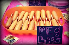 there is a tray full of donuts on display at the table for people to eat