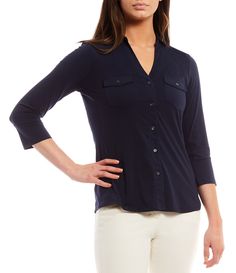 From J.McLaughlin&#x2C; this shirt features:Knit jersey fabricationpoint collar neckline3/4 sleevesFront chest patch pockets with button flapsShirttail hemlineButton front closureApprox. 24" lengthPolyester/spandexHand wash/dry flatImported. Casual Navy Jersey Top, Casual Long Sleeve Jersey Top, Fitted Casual Jersey Top, Casual Fitted Jersey Top, J Mclaughlin, Signature Print, Button Front Shirt, Collar Shirt, Dillard's