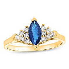 Decorate her finger with this splendid gemstone and diamond ring. Fashioned in warm 14K gold, this elegant style captivates with an 8.0 x 4.0mm marquise-cut bright blue sapphire. Triangular composites of glimmering diamonds flank each side of the center stone to complete the look. Radiant with 1/5 ct. t.w. of diamonds and a brilliant buffed luster, this ring complements her evening-ready wardrobe. Marquise Sapphire And Diamond Ring With Accent Stones, Marquise Sapphire Diamond Promise Ring, Marquise Diamond Birthstone Ring, Classic Blue Marquise Diamond Ring, Marquise Birthstone Ring In 14k Gold, 14k Gold Marquise Birthstone Ring, Formal Marquise Birthstone Ring, Blue Marquise Diamond Ring With Diamond Cut, Marquise Cut Birthstone Diamond Ring For Formal Occasions