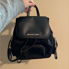 A Brand New Cute Mini Black Backpack! Michael Kors Backpack With Detachable Strap For Everyday Use, Black Backpack With Dust Bag For On-the-go, Luxury Black Backpack For Errands, Michael Kors Black Bag With Zipper Closure, Black Backpack With Branded Hardware, Everyday Backpack With Branded Hardware, On-the-go Backpack With Branded Hardware, Standard Backpack With Branded Hardware For On-the-go, Casual Black Michael Kors Bag