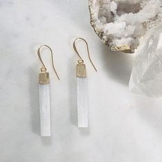 Crystal healing earrings with selenite for protecting against negativity Spiritual White Earrings For Gift, Minimalist Natural Stone Earrings, Minimalist White Moonstone Jewelry, Minimalist White Jewelry With Natural Stones, White Spiritual Dangle Earrings, Spiritual White Dangle Earrings, White Moonstone Earrings For Daily Wear, White Earrings With Natural Stones For Gift, White Moonstone Earrings