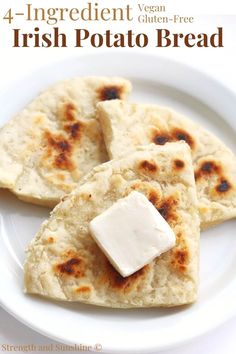 three flatbreads on a plate with butter