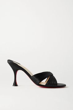 Christian Louboutin's 'Nicol is Back' mules are designed with lustrous satin straps that cross-over at the toe to elegantly frame your foot. They've been made in Italy with the house's signature red lacquered soles and rest on a fluted, 85mm stiletto heel. Style them with bold, patterned pants or pared-back cocktail dresses. Wear it with: Commando Top, The Attico Jeans, The Row Blazer, Coperni Tote. -- Heel measures approximately 85mm/ 3.5 inches - Black satin - Slip on - Made in Italy Black Louboutin Heels, Build Wardrobe, Patterned Pants, Mule Shoes, Expensive Taste, Christian Louboutin Women, The Attico, Louboutin Heels, Lemon Pepper