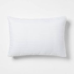 a white pillow on a white background