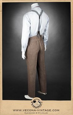 "Prohibition might be over but the jazz age style of the 1920s is present as ever! The high waistband with fishtail back and cinchback are the striking details of these splendid trousers. They feature a buttoned fly, welt pockets and tapered legs. High-quality art déco lining provides comfort and an elegant drape. Six buttons at the outside of the waistband are already in place. You only have to choose your favorite pair of suspenders. Complete these trousers with the matching waistcoat and jack Fitted Brown Bottoms With Welt Pockets, Fitted Brown Pants With Welt Pockets, Fitted Brown Straight Leg Dress Pants, Brown Fitted Straight Leg Dress Pants, Fitted Straight Leg Brown Dress Pants, Brown Bottoms With Belt Loops For Tailoring, Classic Fitted Brown Pants, Brown Pants For Tailoring With Belt Loops, Classic Fitted Brown Bottoms