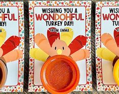 there are two cards with turkeys on them, one has a wax sealer and the other has an orange ring