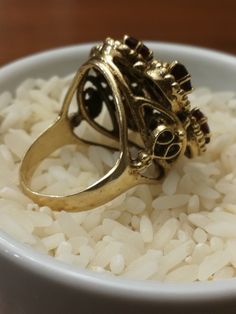 This is the last ring in a set of 5, that I bought in southern Indiana. It's a remarkable Huge 14K ladies Garnet Cluster ring. It weighs a hefty 11.0 grams, and the top measures 24mmx22m. There are 7-6x4mm medium red oval Garnets set with 6 prongs each. There a beaded pattern around each Garnet, and has a scrolled heart design on each side. There are some very fine scratches on a few stones that are considered normal for everyday wear. Its not noticeable unless looking under a 10x loupe. It's a Brass Ring With Lost Wax Casting For Anniversary, Brass Rings With Lost Wax Casting For Anniversary, Heirloom Brass Rings For Anniversary, Unique Brass Rings For Formal Occasions, Ornate Rings With Stone Setting For Anniversary, Oval Brass Rings For Anniversary, Antique Brass Rings With Intricate Design, Brass Rings For Formal Occasions, Vintage Brass Rings With Intricate Design