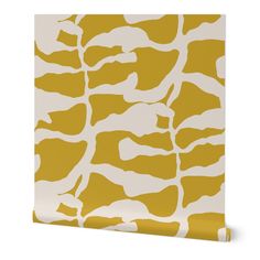 a yellow and white wallpaper with an animal print pattern on the bottom half of it