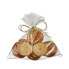 a clear bag filled with sliced oranges and lemon slices on top of each other