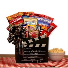 a movie gift basket with popcorn and snacks