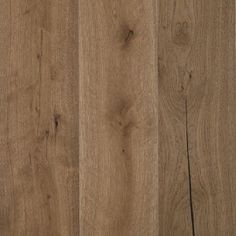 close up view of the wood grains on this hardwood flooring project, which has been