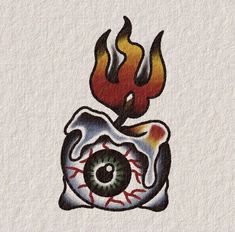 an eyeball with flames coming out of it on a piece of paper that has been drawn