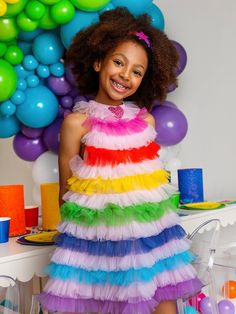 Brighten up your wardrobe with the Rainbow Glow Tutu Dress! This enchanting debut from our Flour Shop collection features a playful A-line shape and a chic halter neck. The dress is a rainbow dream come true, where each tier of tulle showcases a different vibrant color, making every spin a burst of joy. The beaded heart embellishment at the neckline adds a touch of sparkle and charm. Shine Costume, Card Costume, Gala Party, Party Queen, Beaded Heart, Queen Costume, Holiday Costumes, Color Making, Exclusive Dress