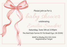 a baby shower party with pink ribbon and bow