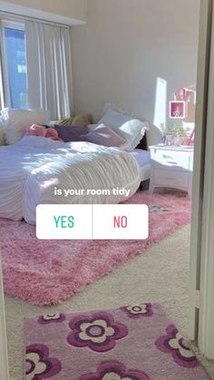 a bedroom with pink carpet and white walls