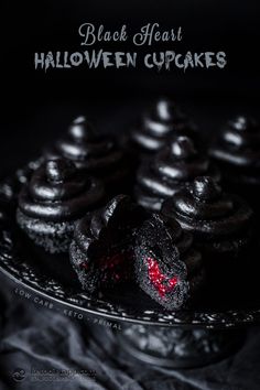 black heart halloween cupcakes on a plate