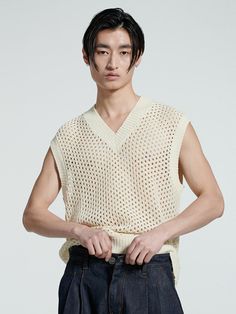 Editor's notesThis vest is made of punching and allows for various layered styling with breathable knitwear. The overall punching detail of the product expresses the texture of the net well, making it stylish and V-neck.- Punching detail- Intended for a loose fit- Ribbed finishes at edges- Versatile styling and easy layeringMeasurements(in.)One size(M-L)- Total length: 26.37 in.- Shoulder: 19.68 in.- Chest: 22.04 in.- Hem: 20.07 in.*Model info: Height 5'97, Waist 130lb, Fitting L size*Depending on the measurement method, an error of 1-3cm may occurComposition & Care- 100%Acrylic- Hand wash separatelyDesigner- by FIELD WORKER Spring Open Knit V-neck Tank Top, Casual Mesh Vest For Summer, V-neck Open Knit Tank Top, Summer Layering Pointelle Knit Sweater Vest, Casual Open Knit Vest For Layering, Spring Sleeveless Open Knit Vest, Summer Open Knit Sweater Vest For Layering, Spring V-neck Open Knit Tank Top, Summer Textured Knit V-neck Sweater Vest