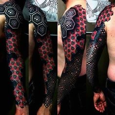 two men with black and red tattoos on their arms, one has an intricate design