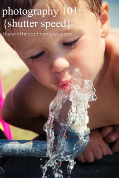 a young boy drinking water from a blue faucet with the caption photography 101 shutter speed