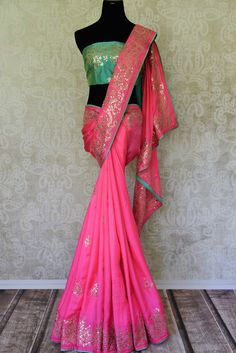 Quite an alluring pink silk saree for parties and weddings. The contrast blouse and ticki work makes it all the more desirable. Pink Saree With Contrast Blouse, Plain Saree With Heavy Blouse, Pink Silk Saree, Draping Styles, Heavy Blouse, Sarees Banarasi, Sewing Patterns Free Women, Saree Draping Styles