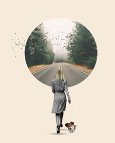 a woman walking down the road with a dog in front of her and birds flying overhead