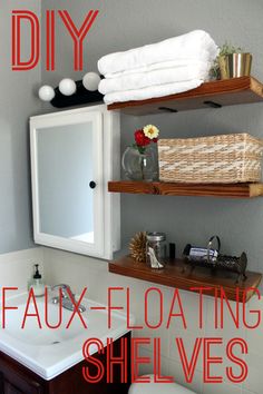 a bathroom with floating shelves above the sink and towels on top of it, along with text overlay that reads diy faux floating shelves