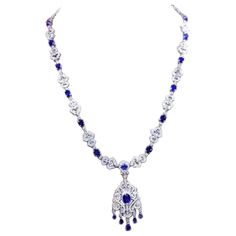 An exclusive necklace in Art Deco design, so extremely refined and original, perfect style for glamour ladies. Necklace come in 18k gold with 19 pieces of perfect oval and pear cut natural Ceylon Sapphires of 23,06 carats, extra fine quality, stunning color , and 511 pieces of natural diamonds of 9,32 carats, F color VS clarity. On request, I can customize length. Handcrafted by artisan goldsmith. Excellent manufacture and quality of stones. Complete with AIG report. Whosale price. Note: on my shipment, no taxes. Ladies Necklace, 18k Gold Necklace, Ceylon Sapphire, Boot Jewelry, Perfect Style, Art Deco Design, Pear Cut, Jewelry Inspiration, Stone Color