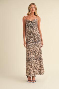 This Feline Fancy Dress showcases a bold leopard print and a stylish cowl neckline. Made with mesh material, it stands out in any crowd. With its maxi length, it is the perfect statement piece for a fancy night out. 95% polyester, 5% spandex Return Policy WE ONLY OFFER STORE CREDIT FOR RETURNS! Feel free to email us at info@shopluxxeapparel.com or DM us with any questions regarding fit, styling, or our return policy in general. To read more into our return policy please click here. Fitted Cowl Neck Maxi Dress For Date Night, Summer Party Maxi Dress With Cowl Neck, Fitted Maxi Dress With Cowl Neck For Party, Chic Summer Maxi Dress With Cowl Neck, Fitted Cowl Neck Maxi Dress For Party, Chic Cowl Neck Maxi Dress For Summer, Chic Leopard Print Party Maxi Dress, Spring Leopard Print Maxi Dress, Fitted Leopard Print Maxi Dress For Date Night