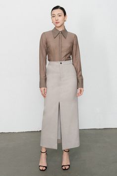 This trendy shirt offers a modern style and a luxurious feel. Crafted of 100% silk, it's comfortable to wear and features stylish straight sleeve cuffs. Instantly elevate your wardrobe with this versatile and timeless piece. Long Skirt Office Outfit, Khakis Outfit, Khaki Coat, Skirt Inspiration, Organza Shirt, Shirt Dress Outfit, Mean Blvd, Skirt Blouse, Office Skirt