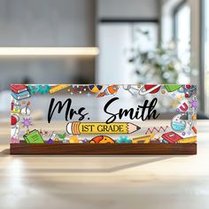 a wooden sign that says, mrs smith 1st grade